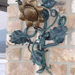 A wrought iron sunflower as a side lamp - Hand forged candleholders and lamps