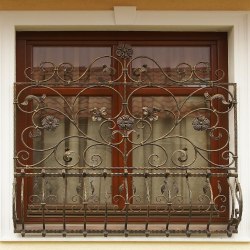 A decorative wrought iron grille