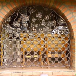 A fixed wrought iron grille