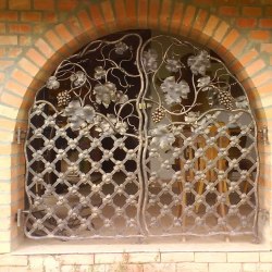 A movable wrought iron grille