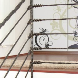A forged stair railing - Knot pattern