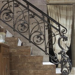 A hand wrought iron railing - Interior handrails