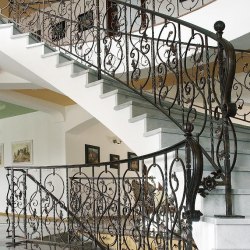 A spiral wrought iron railing - Interior handrails