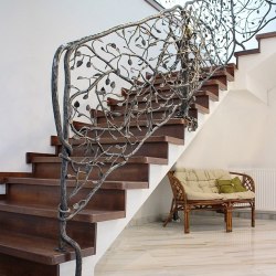 Exclusive hand wrought iron interior staircase railing
