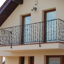 A hand wrought iron balcony railing - crazy