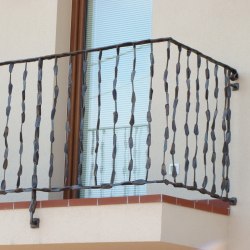 A modern forged balcony railing - crazy