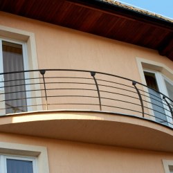A modern wrought iron balcony railing 