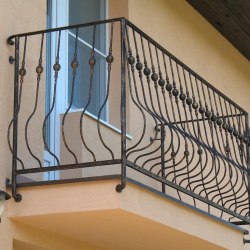 A wrought iron balcony railing