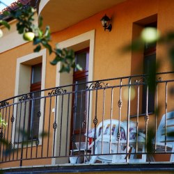 A wrought iron balcony railing