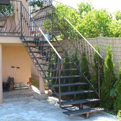 A wrought iron staircase balustrade