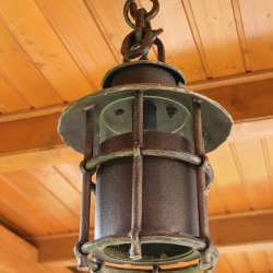 A ceiling light for a summer house - Forged candleholders and lamps