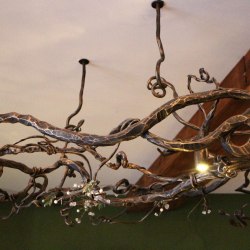 A wrought iron chandelier- roots - Hotel Galileo reception- Donovaly