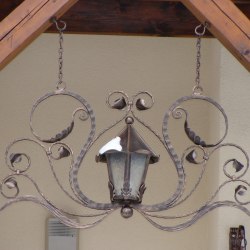 A wrought iron lamp - house entrance - Forged candleholders and lamps