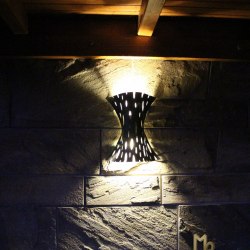 A wrought iron lamp shade