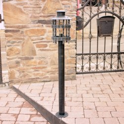 A wrought iron standard lamp Historical - exterior lamps