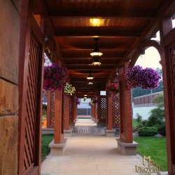 Wrought iron ceiling lights in a summer house