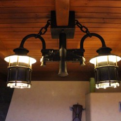 Wrought iron ceiling lights in a summer house