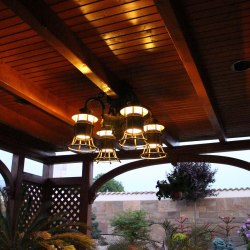 Wrought iron ceiling lights in a summer house