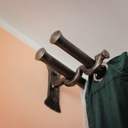 A wrought iron curtain rod - a detail