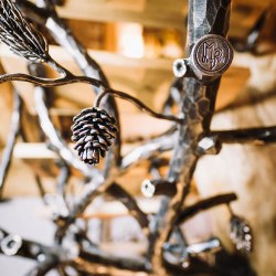 A hand wrought iron interior staircase railing - a detail