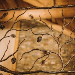 A hand wrought iron interior staircase railing - a detail