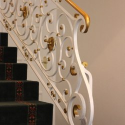 A wrought iron handrail - Interior handrails