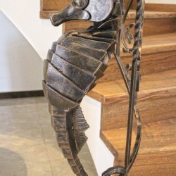 A wrought iron seahorse - a handrail detail